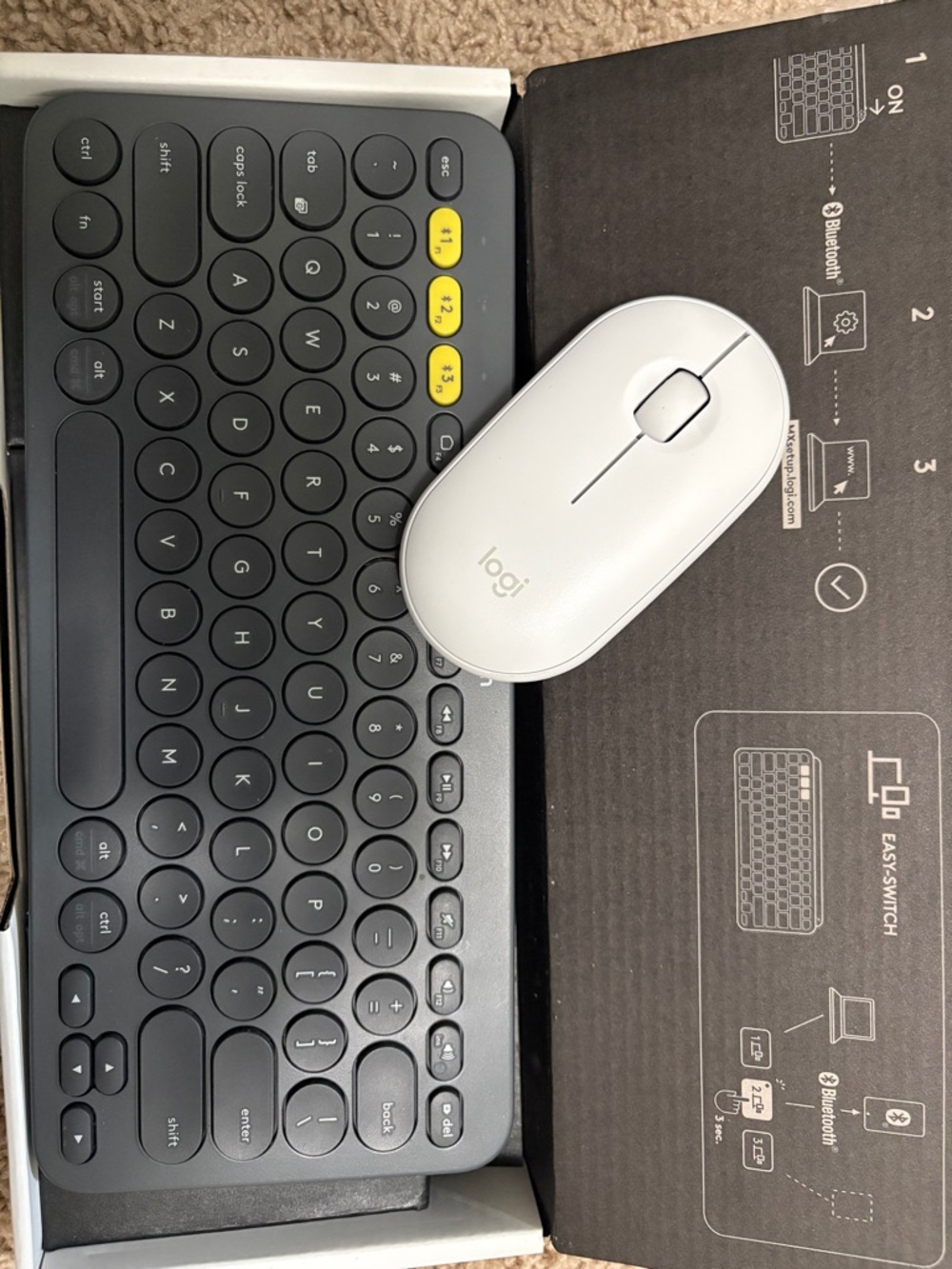 Logitech Dark Gray Wireless Keyboard with White Mouse and Yellow Shortcut Keys